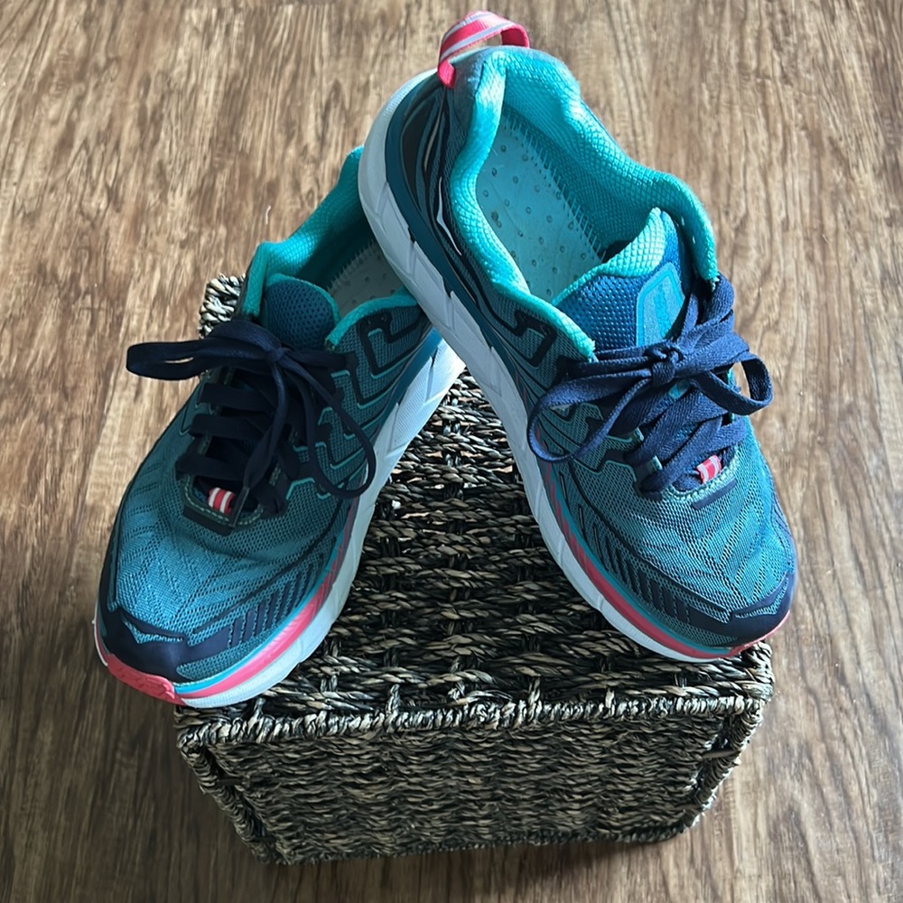 HOKA one one! Women’s size 9D. Clifton #4 still good. No inserts. Teal color.